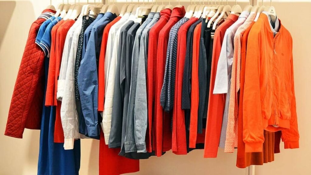 a top-down view showcasing webfreen.com minimalist clothing items in neutral tones
